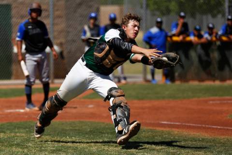 Rancho’s catcher Matthew Baughn (5) catches a pop-up against Basic during the first in ...
