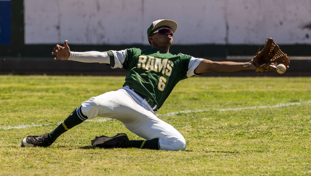 Rancho right fielder Kagen Kennedy misses a pop fly foul ball during the fourth inning while ...