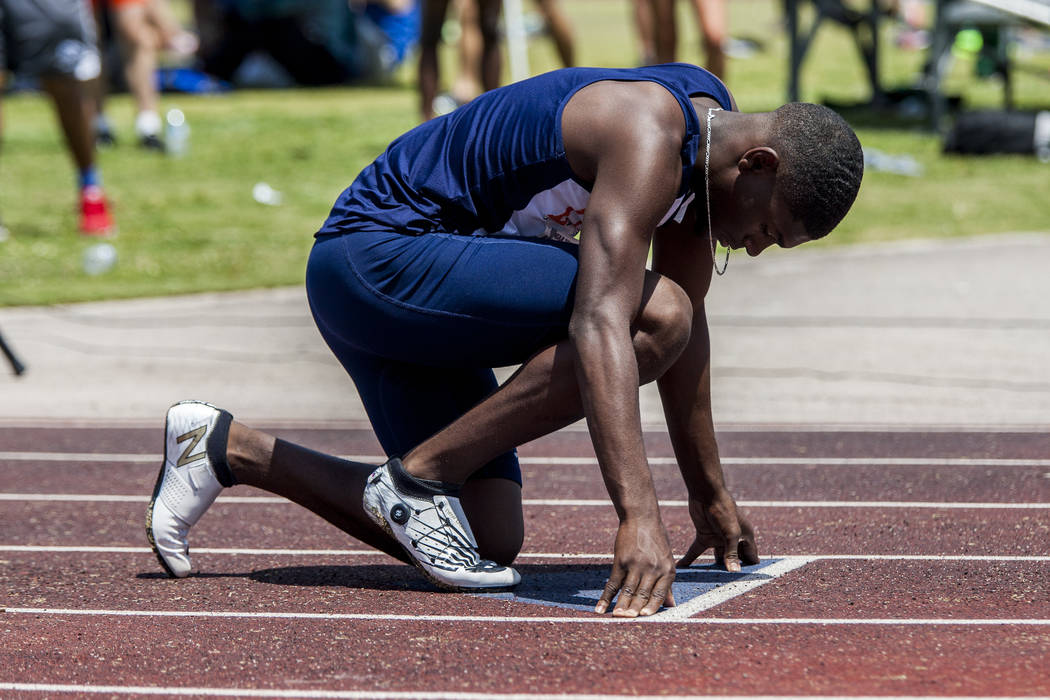 Legacy senior sprinter Jeriel Thomas prepares to run in the 400-meter sprint, ultimately win ...