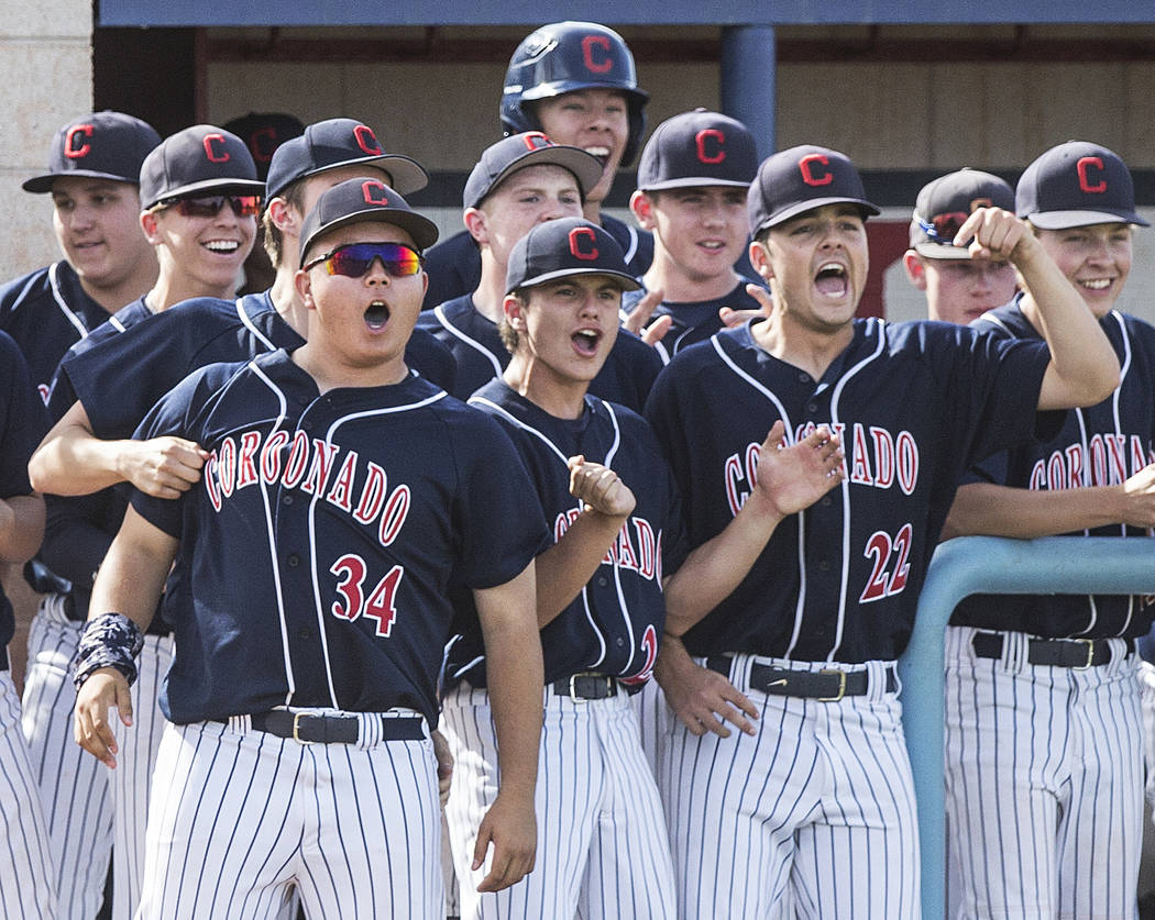 Coronado players celebrate after first baseman Boston Mabeus (23) scores in the first inning ...