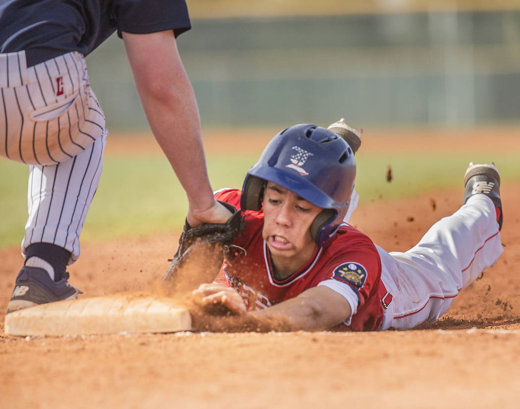 Liberty’s Jack Hale (20) is picked off at first base by Coronado’s Boston Mabeus ...