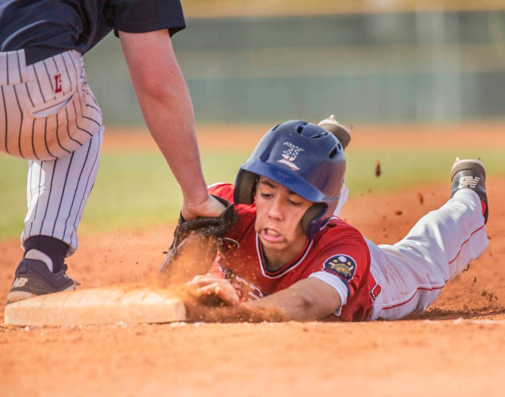 Liberty’s Jack Hale (20) is picked off at first base by Coronado’s Boston Mabeus ...