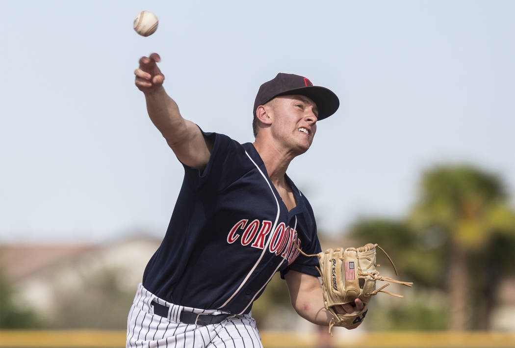 Coronado starting pitcher Kyle Hall (4) throws a pitch in the first inning during the Cougar ...