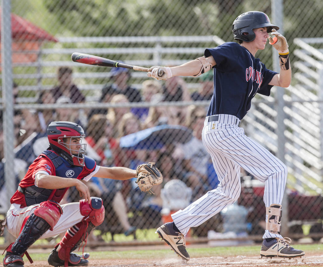 Coronado’s Ethan Stephens (24) singles in a run in the second inning during the Cougar ...