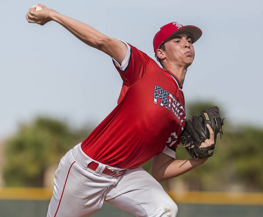 Liberty pitcher Garrett Maloney (55) makes a pitch in the second inning during the Patriots ...