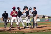 Palo Verde players congratulate Tyler Kim after his two-run home run in the third inning aga ...