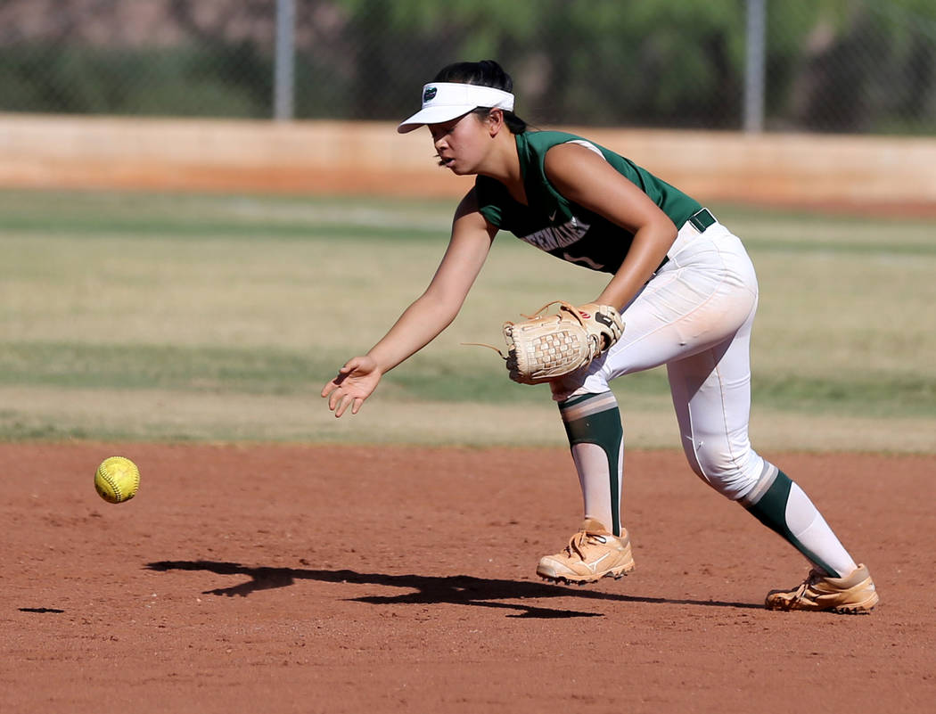 Green Valley infielder Katrina Ramos (1) bobbles the ball in the second inning of a softball ...