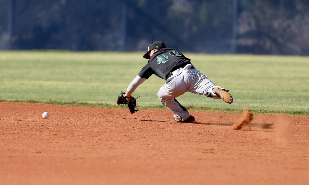 Palo Verde’s Nate Bartlett pulls in a Centennial ground ball in the second inning of t ...