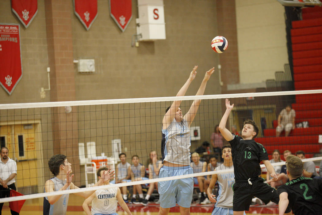 Centennial High School’s Tyler Godown (16) spikes the ball against Palo Verde High Sch ...