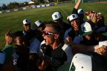 Rancho’s Joey Walls, center, celebrates with teammates after defeating Coronado in the ...