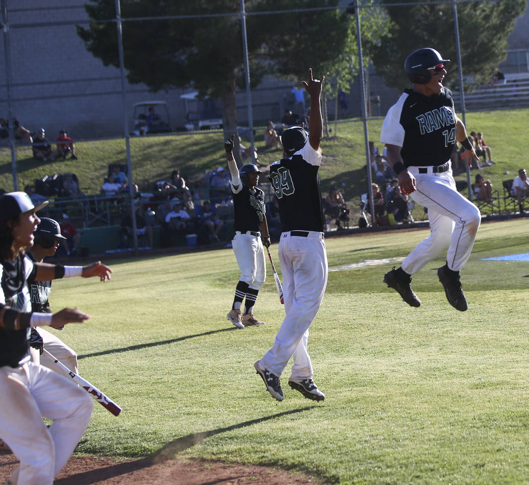 Rancho players react to a grand slam hit by Rancho’s Anthony Guzman, not pictured, dur ...