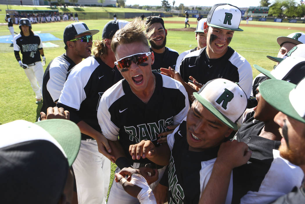 Rancho’s Joey Walls, center, celebrates his run with teammates during the Sunset Regio ...