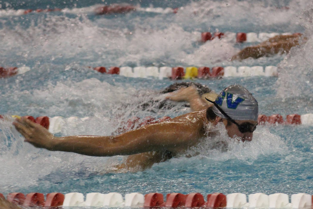 Green Valley’s Andrew Navarro competes in the 100-yard butterfly at the Class 4A Sunri ...