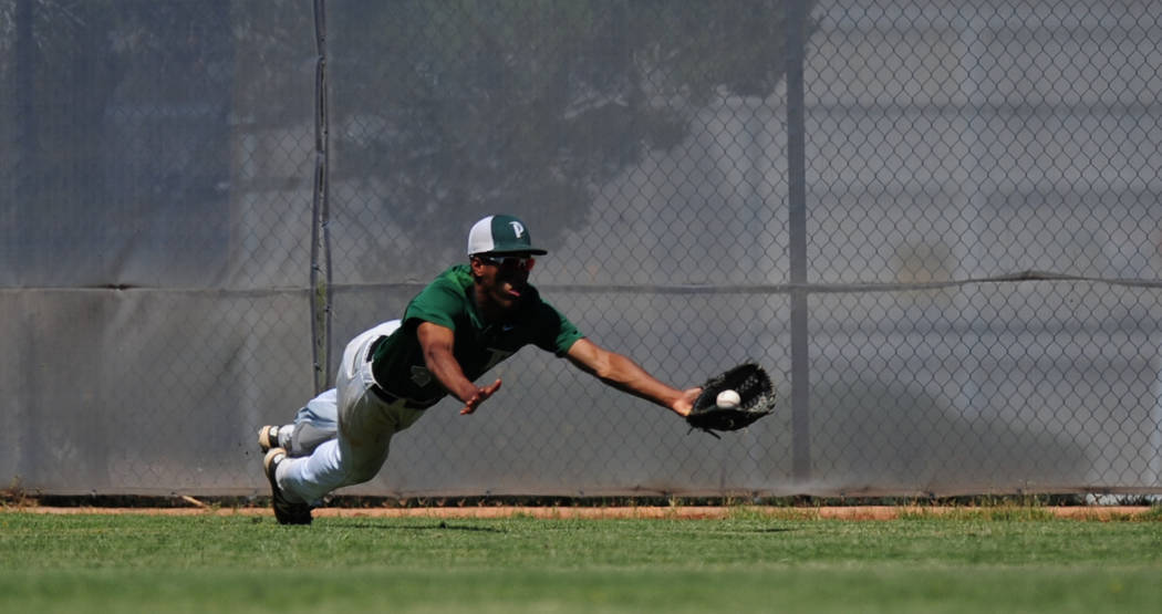 Palo Verde outfielder Karsonne Winters makes a diving catch against Centennial in the first ...