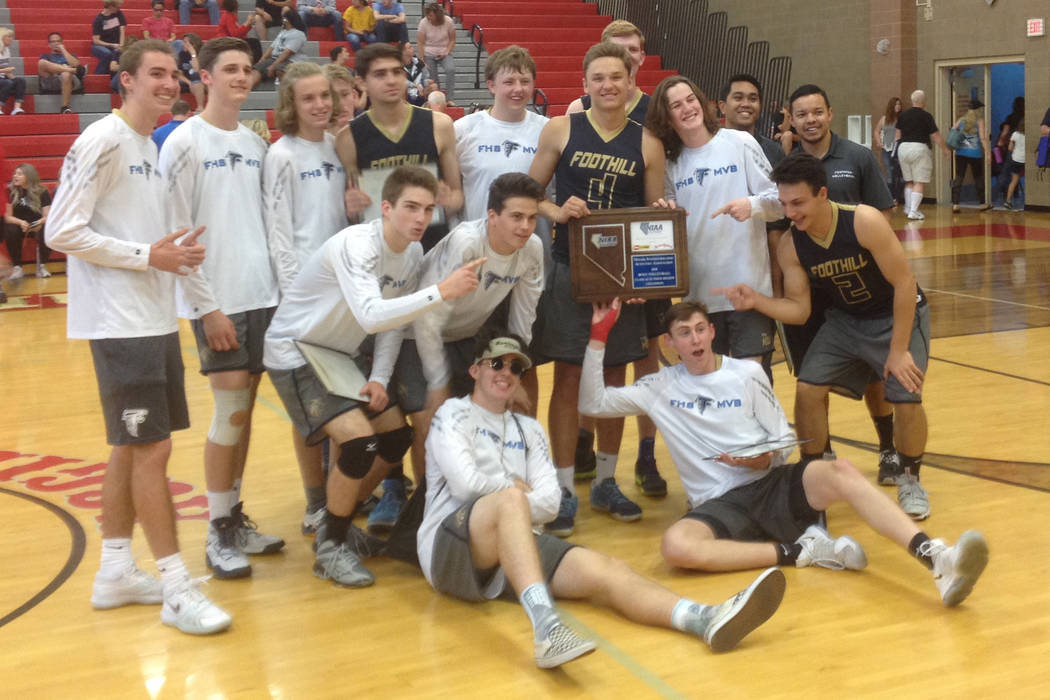 Foothill’s boys volleyball team poses with the Class 4A Sunrise Region championship tr ...