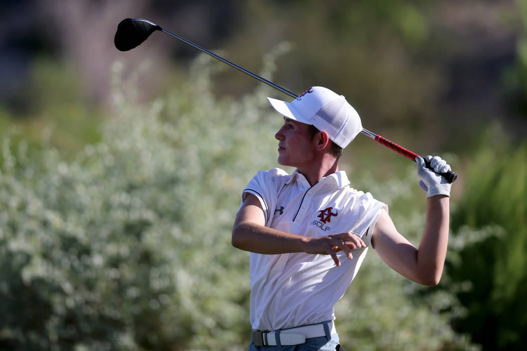 Arbor View’s Cameron Gambini watches his tee shot on 15th hole at Reflection Bay Golf ...