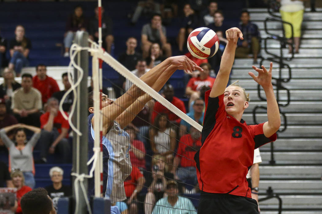 Centennial’s Teon Taylor (13) defends against an attack from Las Vegas’ Shaun Ka ...