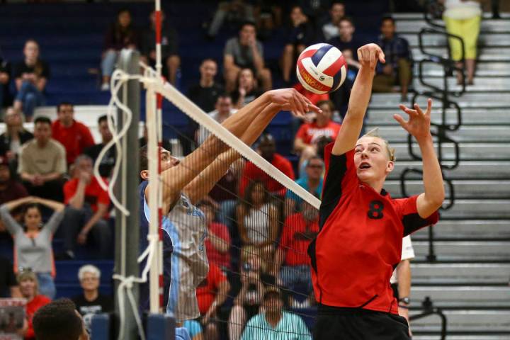 Centennial’s Teon Taylor (13) defends against an attack from Las Vegas’ Shaun Ka ...