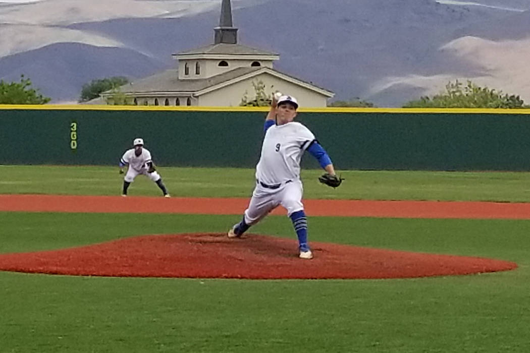 Basic’s C.J. Dornak fires a pitch against Reno in the Class 4A state baseball tourname ...