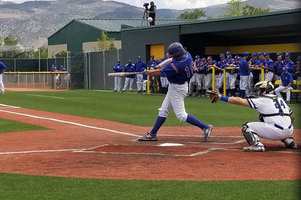 Reno’s Mickey Coyne fouls ff a pitch against Basic in the Class 4A state baseball tour ...