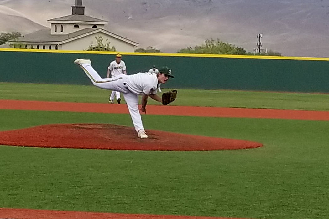 Bishop Manogue’s Angelo Reviglio fires a pitch against Palo Verde in the Class 4A stat ...