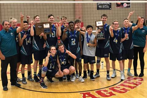 Sky Pointe boys volleyball players pose for a picture after claiming the Class 3A state cham ...