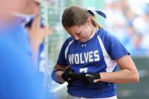 Basic Wolves’ Shelby Basso reacts to making the final out against the Douglas Tigers i ...