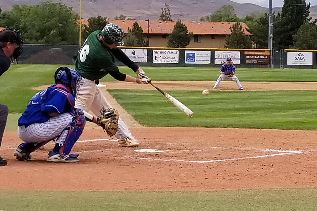 Palo Verde’s Jossiah Cromwick delivers an RBI double against Reno in the Class 4A stat ...