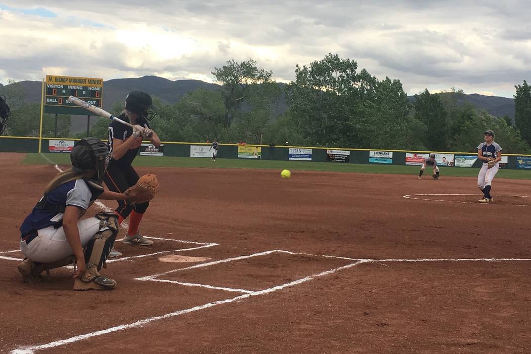Shadow Ridge’s Mia Voges pitches to a Douglas hitter in a Class 4A state softball tour ...