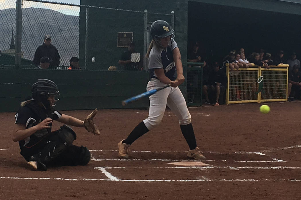 Shadow Ridge’s Caitlyn Covington swings at a pitch from Douglas in a Class 4A state so ...
