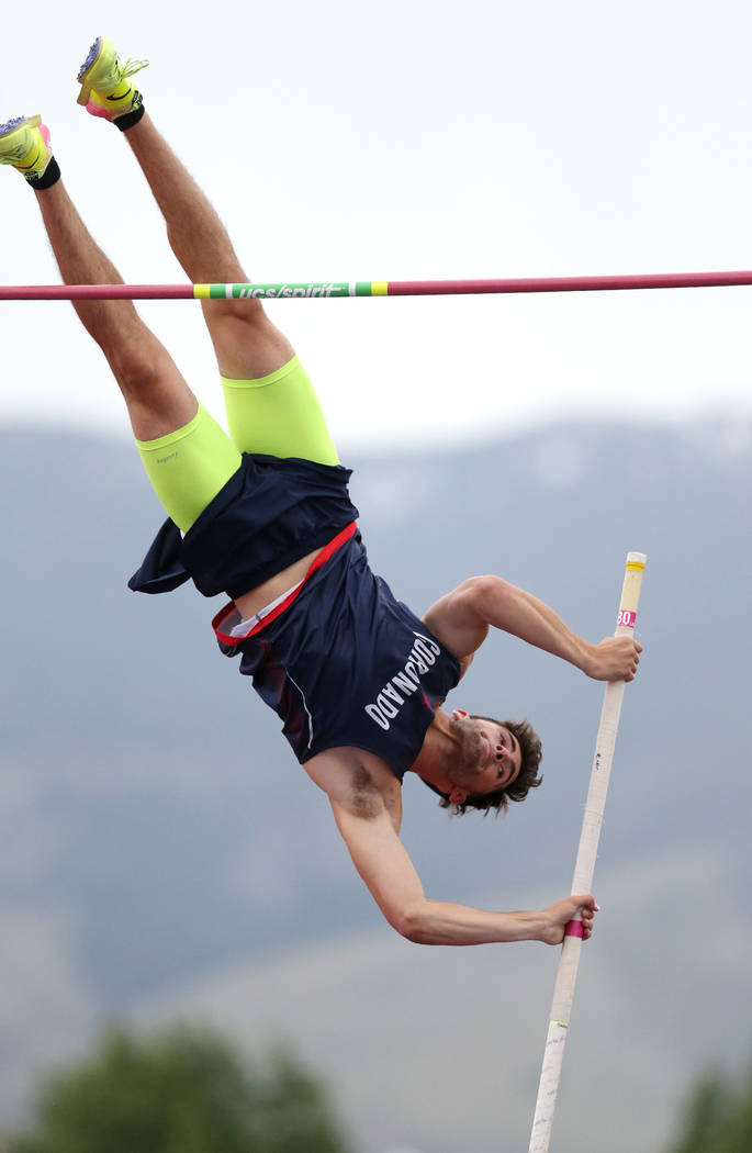Coronado’s Edward Andrews clears 15-0 in the pole vault to tie for the title at the NI ...