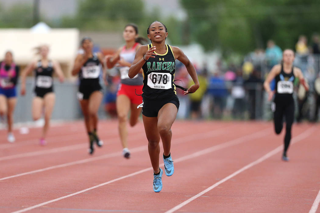 Rancho’s Gizelle Reid wins the 4A 400 at the NIAA Track & Field Championships at ...