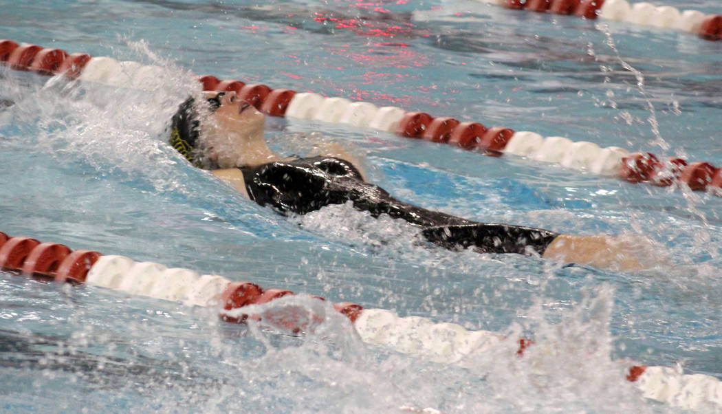 Del Sol’s Brynn Sproul competes in the 100 backstroke at the Class 3A state swimming c ...