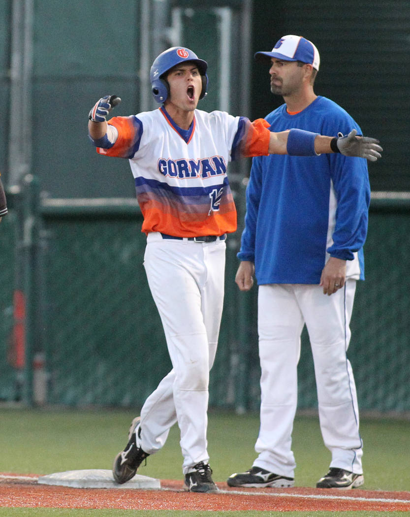 Bishop Gorman’s Kenny Meimerstorf yells to his teammates after hitting a two-run singl ...