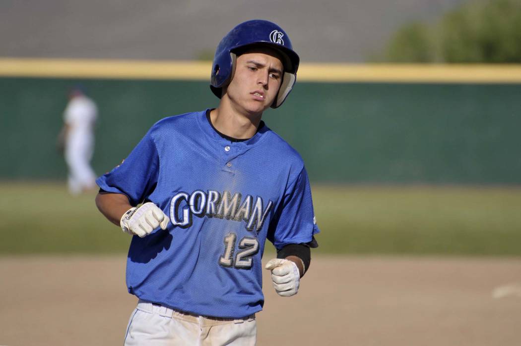 Kenny Meimerstorf rounds third after his homerun during play against Reno at Bishop Manogue ...