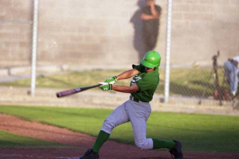 Green Valley’s Dave Krynzel takes a swing against Silverado at Green Valley High Schoo ...