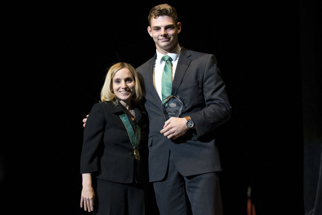 Olympic gold medalist Kerri Strug, left, poses with Jayden Perkins, Virgin Valley High ...
