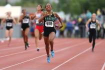 Rancho’s Gizelle Reid wins the 4A 400 at the NIAA Track & Field Championships at ...