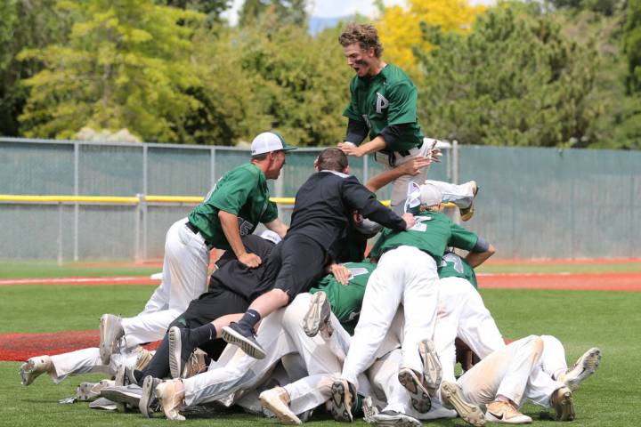 Palo Verde players celebrate their 4-2 win over Basic for the NIAA 4A baseball championship ...