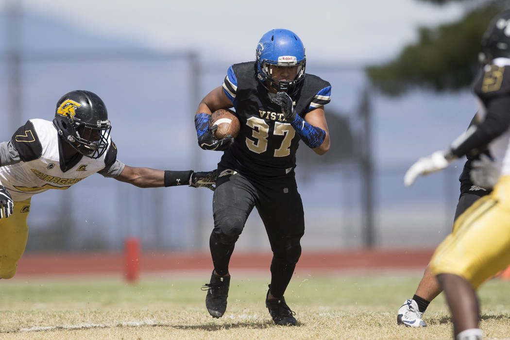 Sierra Vista’s Jahssiah Maiava (37) runs the ball against Clark in their football game ...