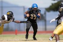 Sierra Vista’s Jahssiah Maiava (37) runs the ball against Clark in their football game ...