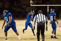 Desert Pines quarterback Tyler Williamson (1) throws for a touchdown during the Class 3A sta ...