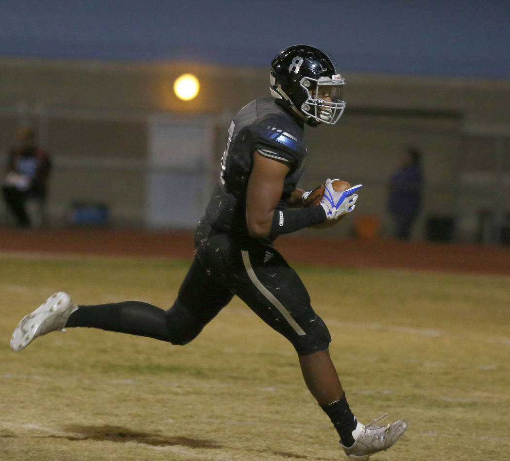 Desert Pines’ linebacker Dejon Pratt, 8, scores a touchdown after Sunrise Mountain&#82 ...