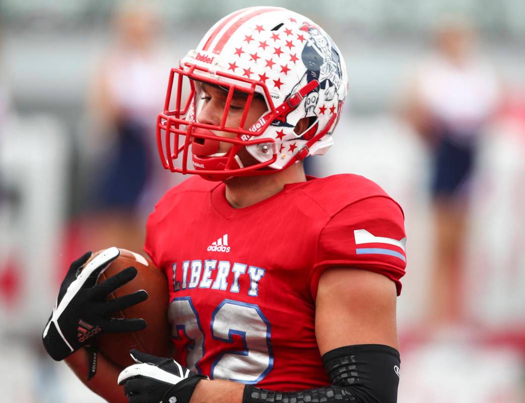 Liberty’s Kyle Beaudry (32) scores a touchdown during a football game against Alta at ...