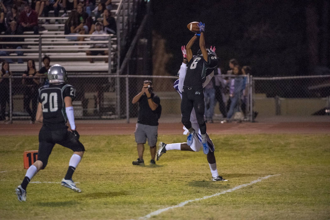 Green Valley defensive back Antoin Kealoha (6) intercepts the ball in front of Silverado rec ...