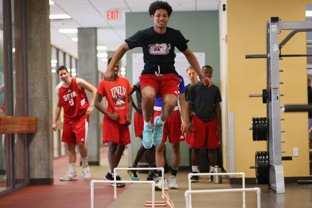 Daishen Nix, 16, during a fitness training session with his basketball team at YMCA, 4141 Me ...