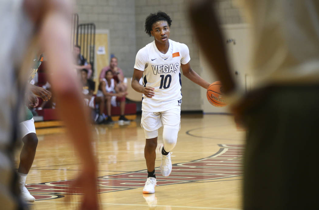 Vegas Elite guard Zaon Collins (10) brings the ball up court while playing against We All Ca ...