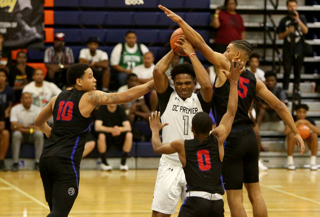 DC Premier’s Sherif Kenny (1) tries to keep the ball from The Truth’s Ismael Cru ...