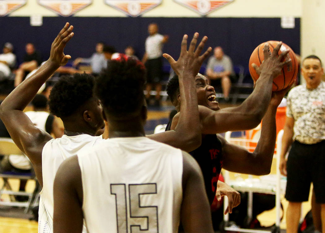 The Truth’s Prince Gilliam (23) tries for a basket against DC Premier at the Fab 48 to ...