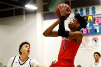 Coronado’s Jaden Hardy (1) shoots against Foothill’s Jace Roquemore (22) during ...